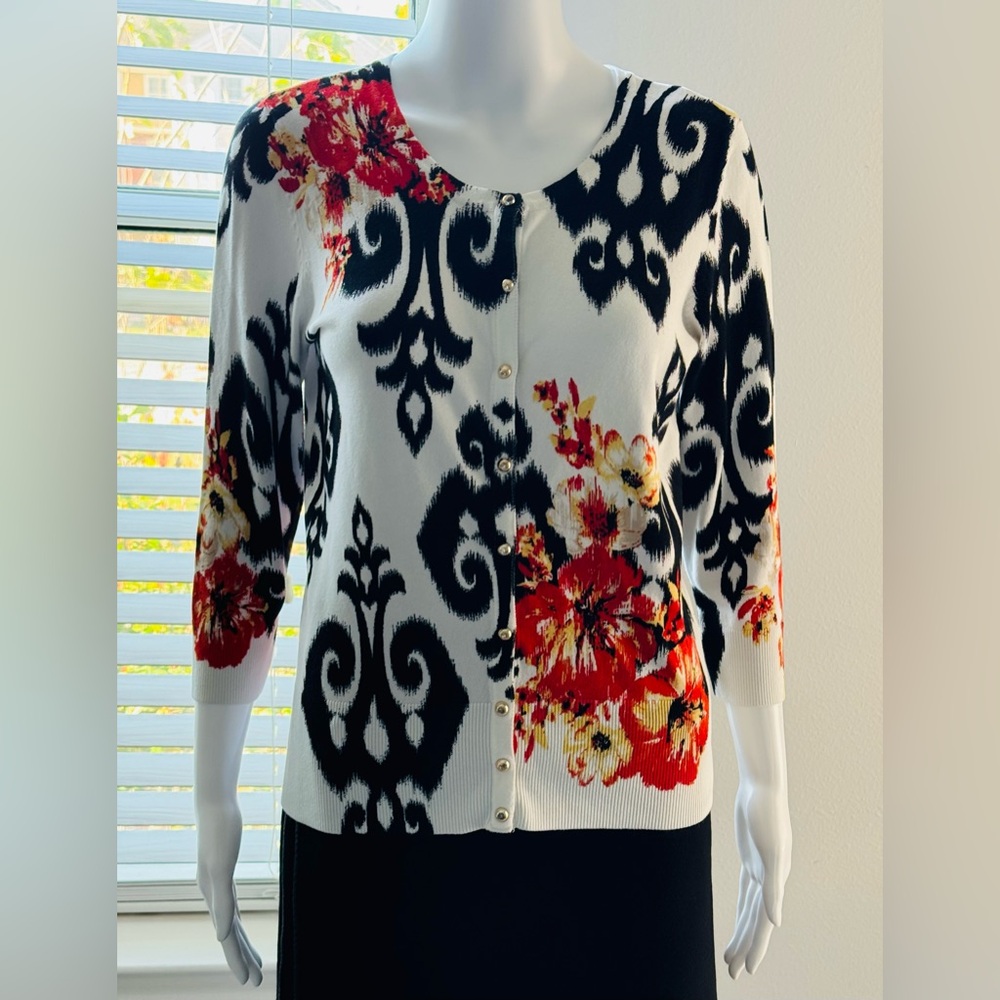 White House Black Market cardigan, size M, with a floral "fleur-de-lis" pattern